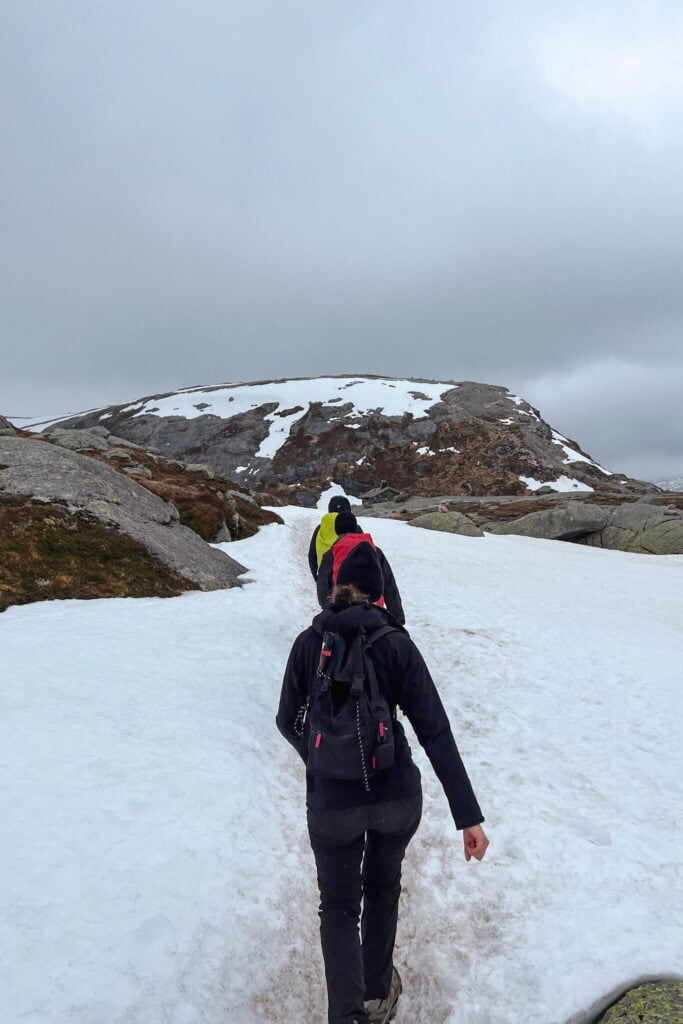 Walking along the snowy mountaintop
