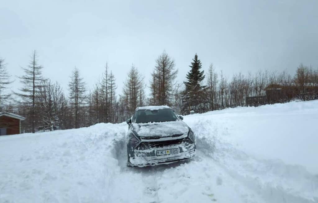We woke up one morning with our car completely snowed in!