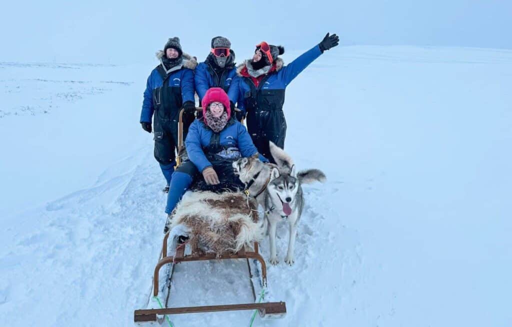 Us on our husky sleds in Iceland