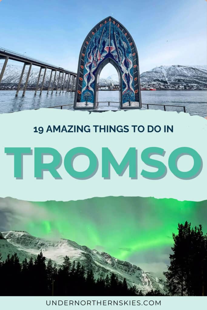 Colourful Arctic-themed archway with snowy landscape and mountains in Tromsø, Norway.